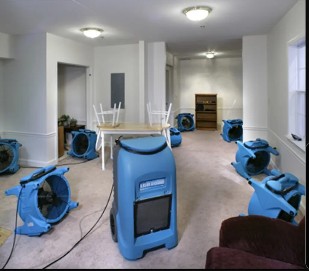 Air movers and dehumidifier setup for Water Damage Restoration in Olmsted Falls